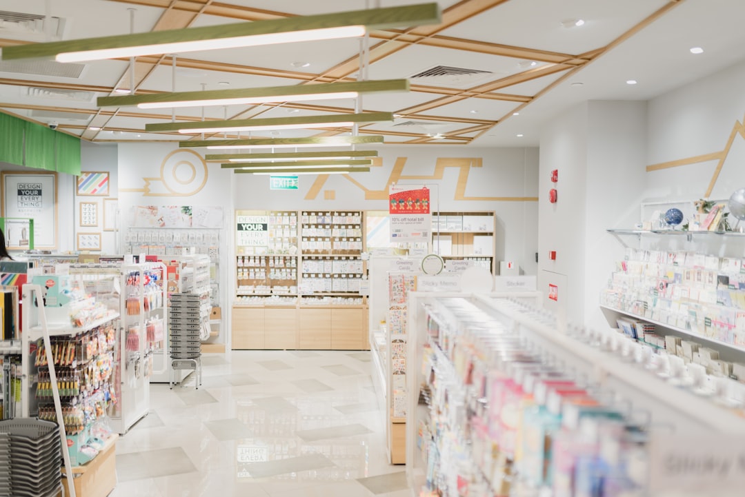 Inside Dava Bazaar chemist shop in Marine Lines showing well organised shelves of medicines and wellness products